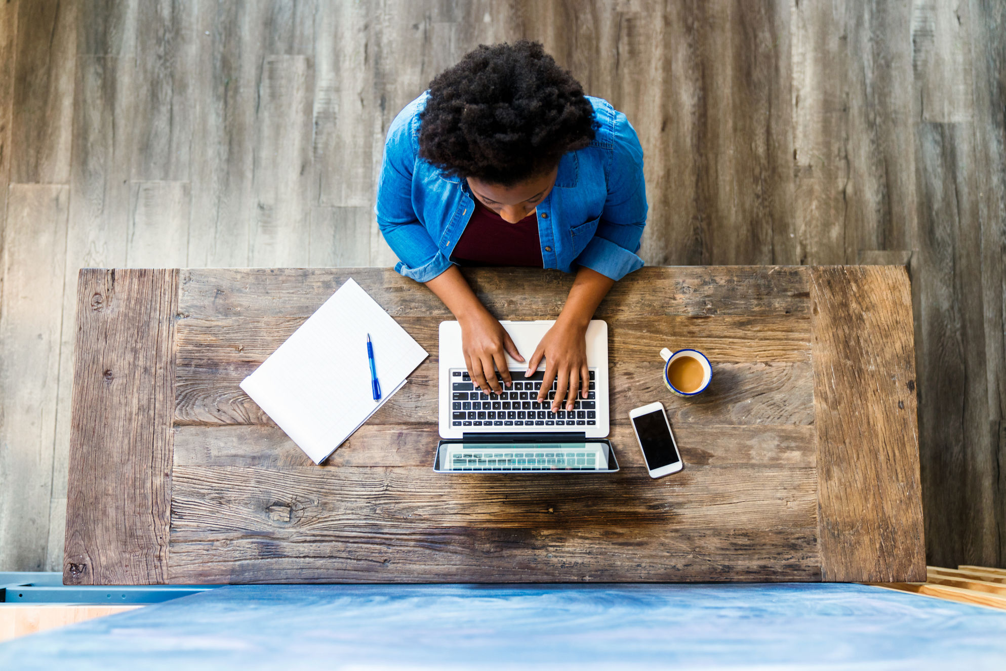 Woman working on the computer at her desk